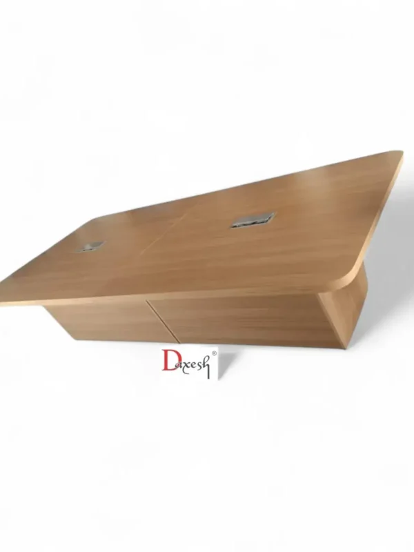 "Side view of wooden conference table."